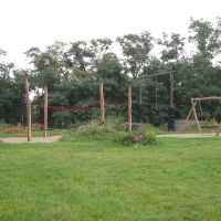 Kletteranlage von FREISPIEL mit Nestschaukel im Park