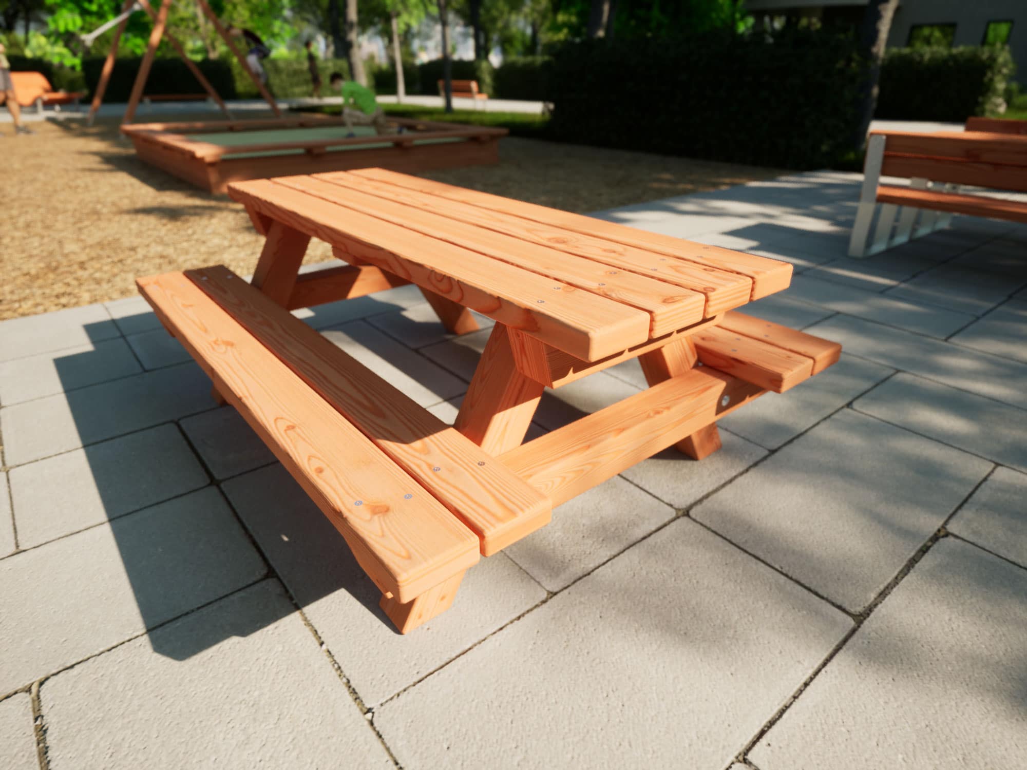 Picknicktisch für Kinder aus Holz vor einem Spielplatz